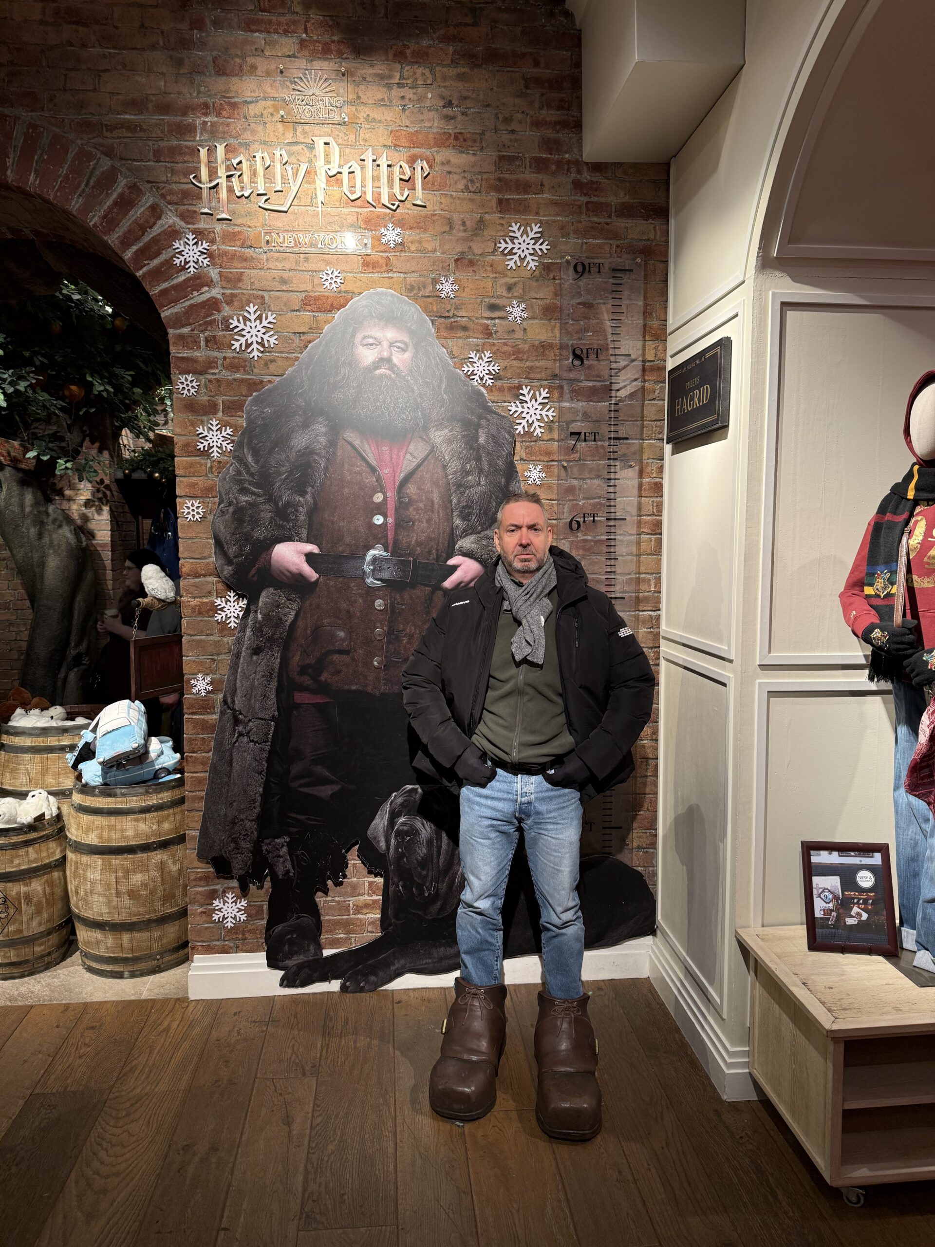 Brooklyn, New York — a man standing in front of a wall with a picture of a hog potter