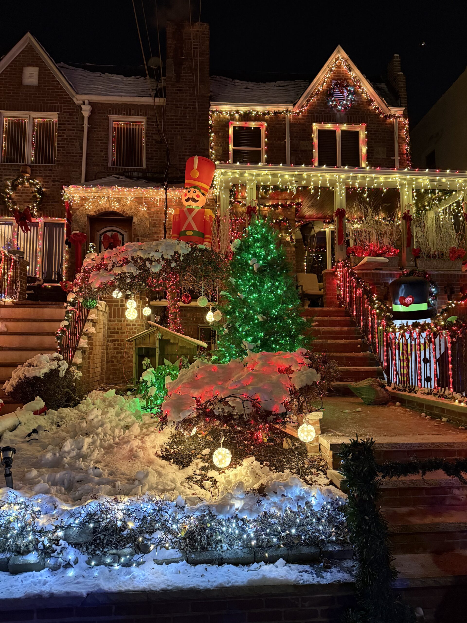 Brooklyn, New York — a house with a christmas tree and a christmas tree
