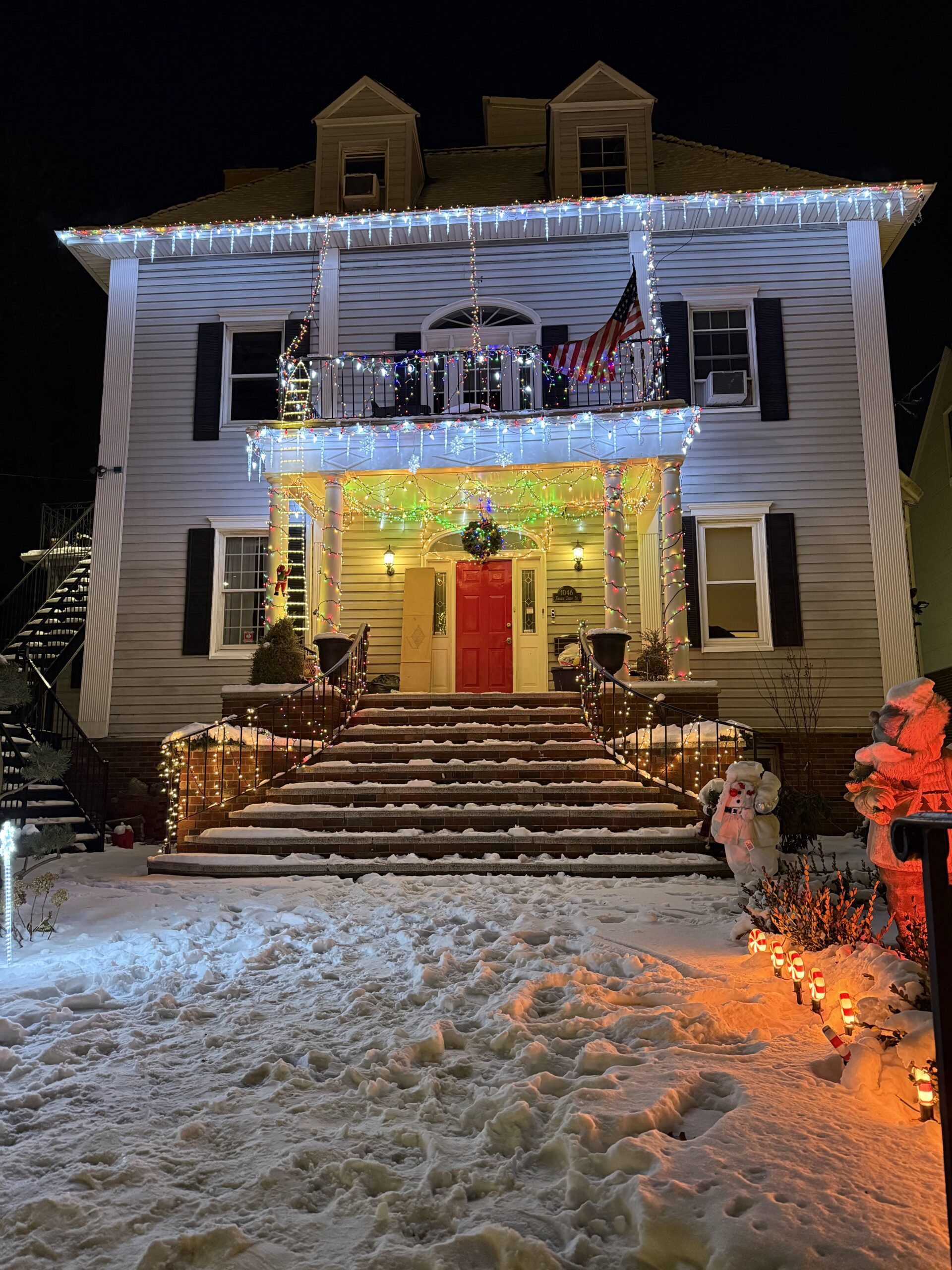 Brooklyn, New York — a house with a christmas tree and lights