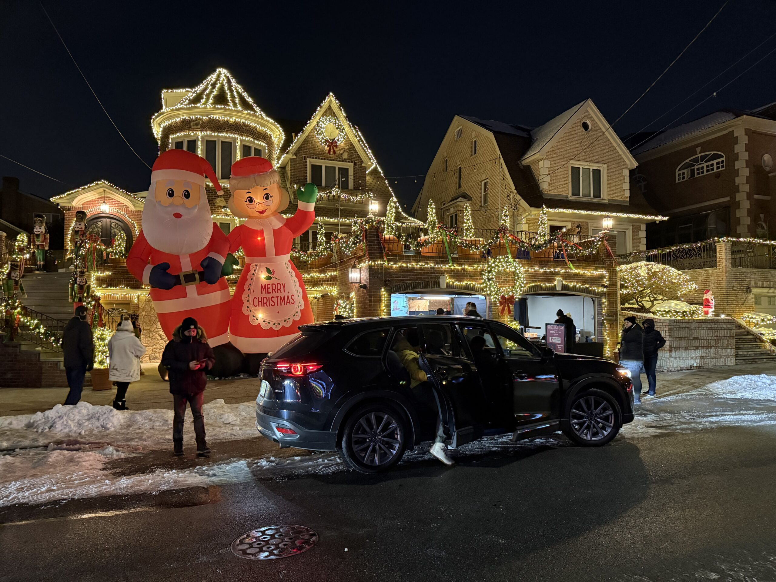 Brooklyn, New York — a car parked in front of a house with a christmas decoration