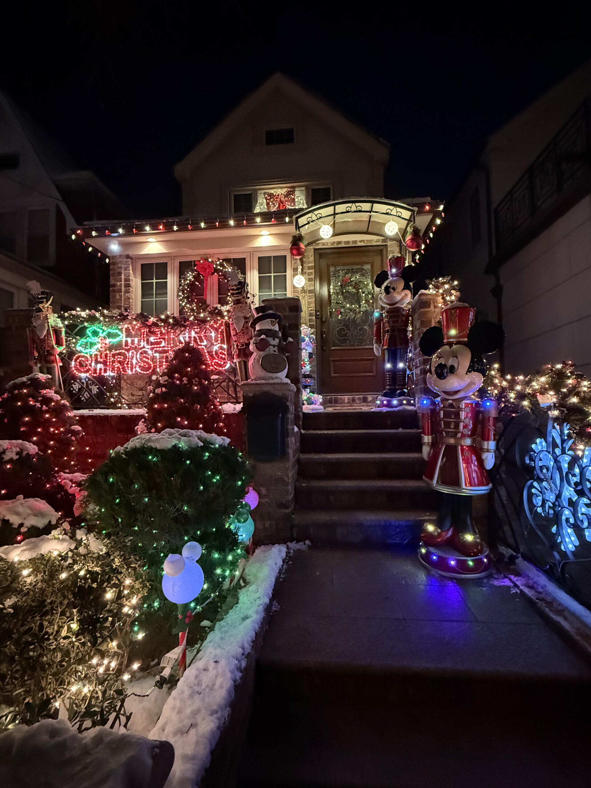 Brooklyn, New York — a house with christmas lights and decorations on the front porch
