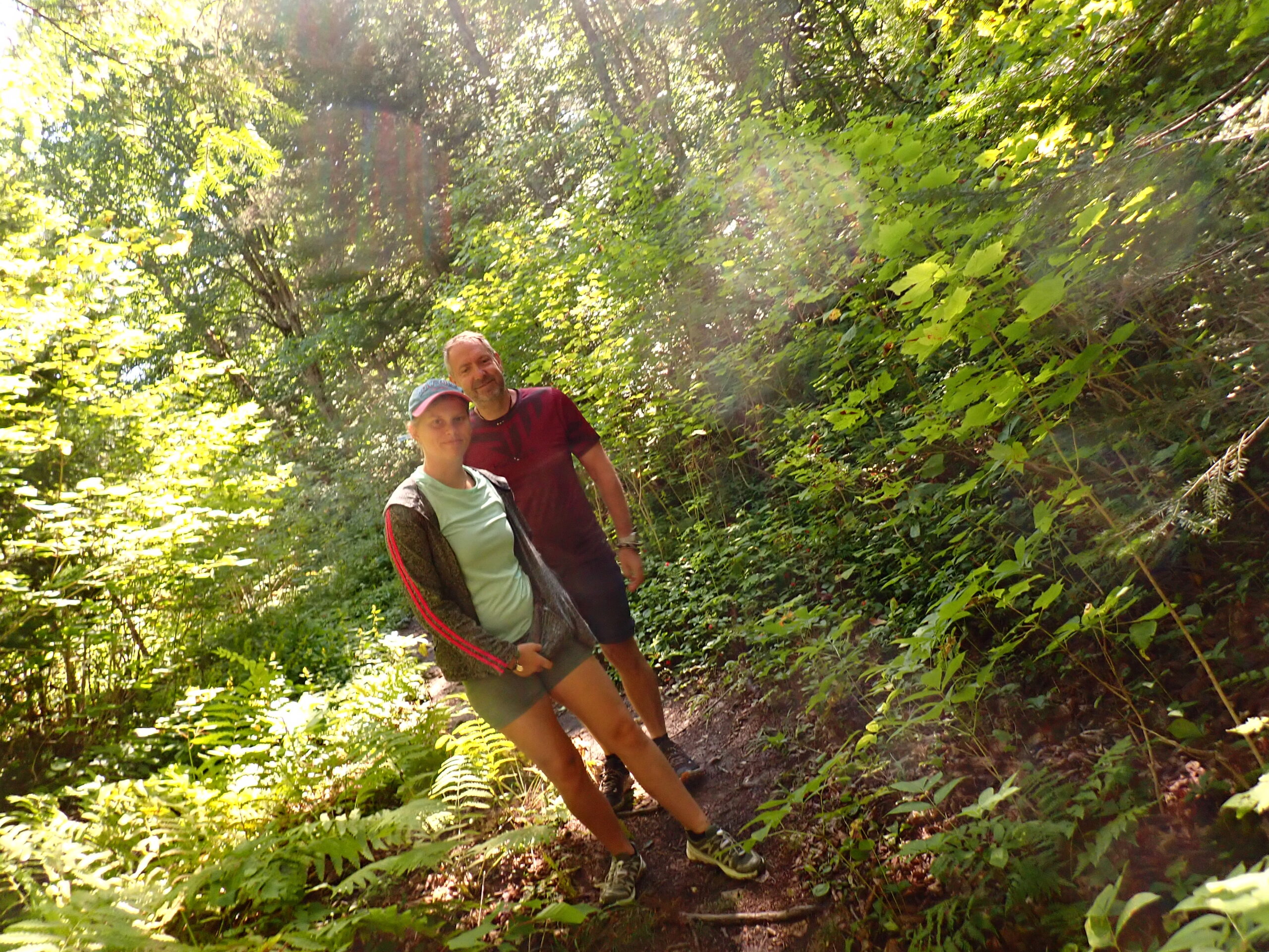 a man hiking through the woods