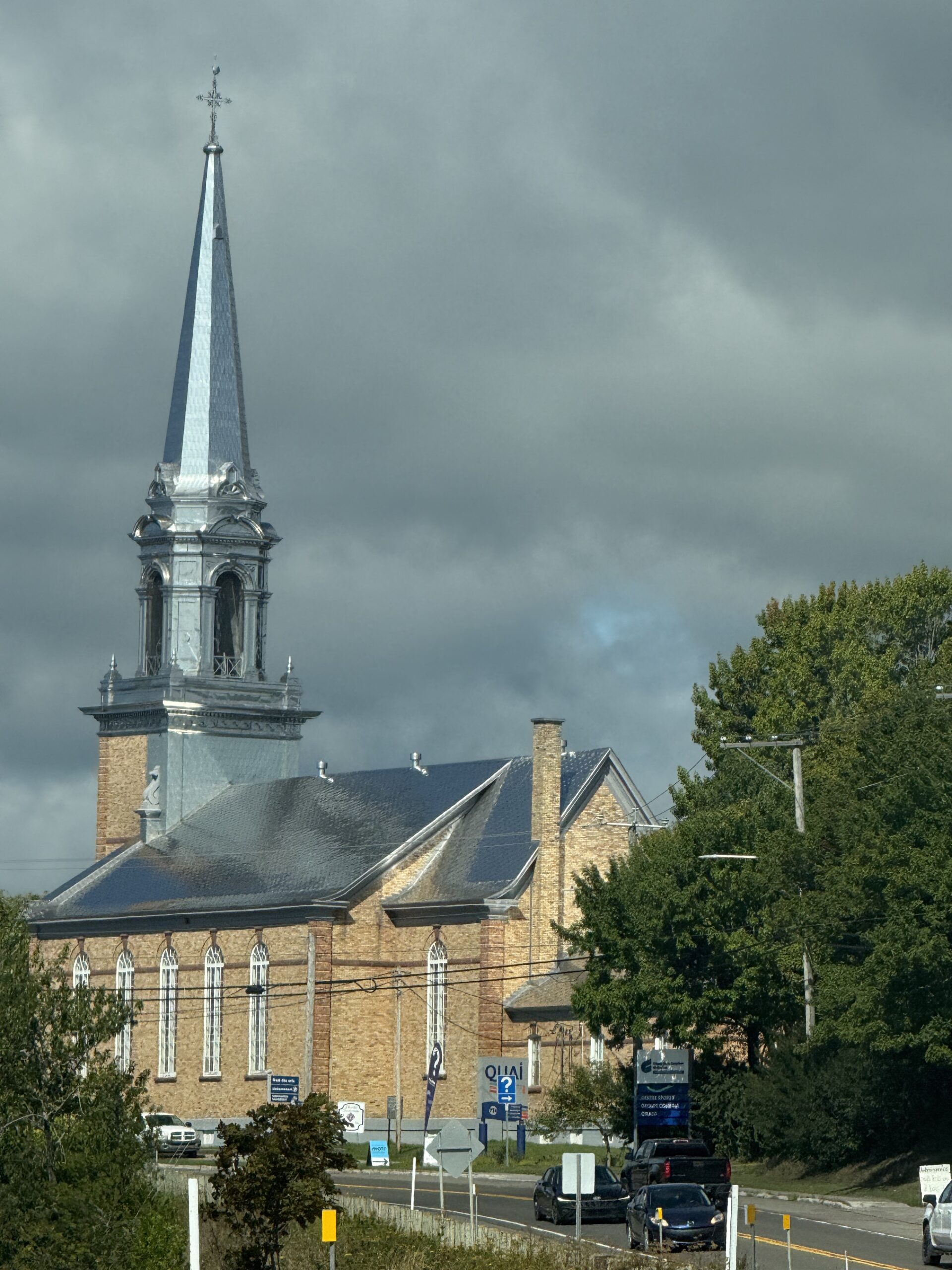 a church with a steeple on the top, Carleton-sur-Mer, Québec, Canada