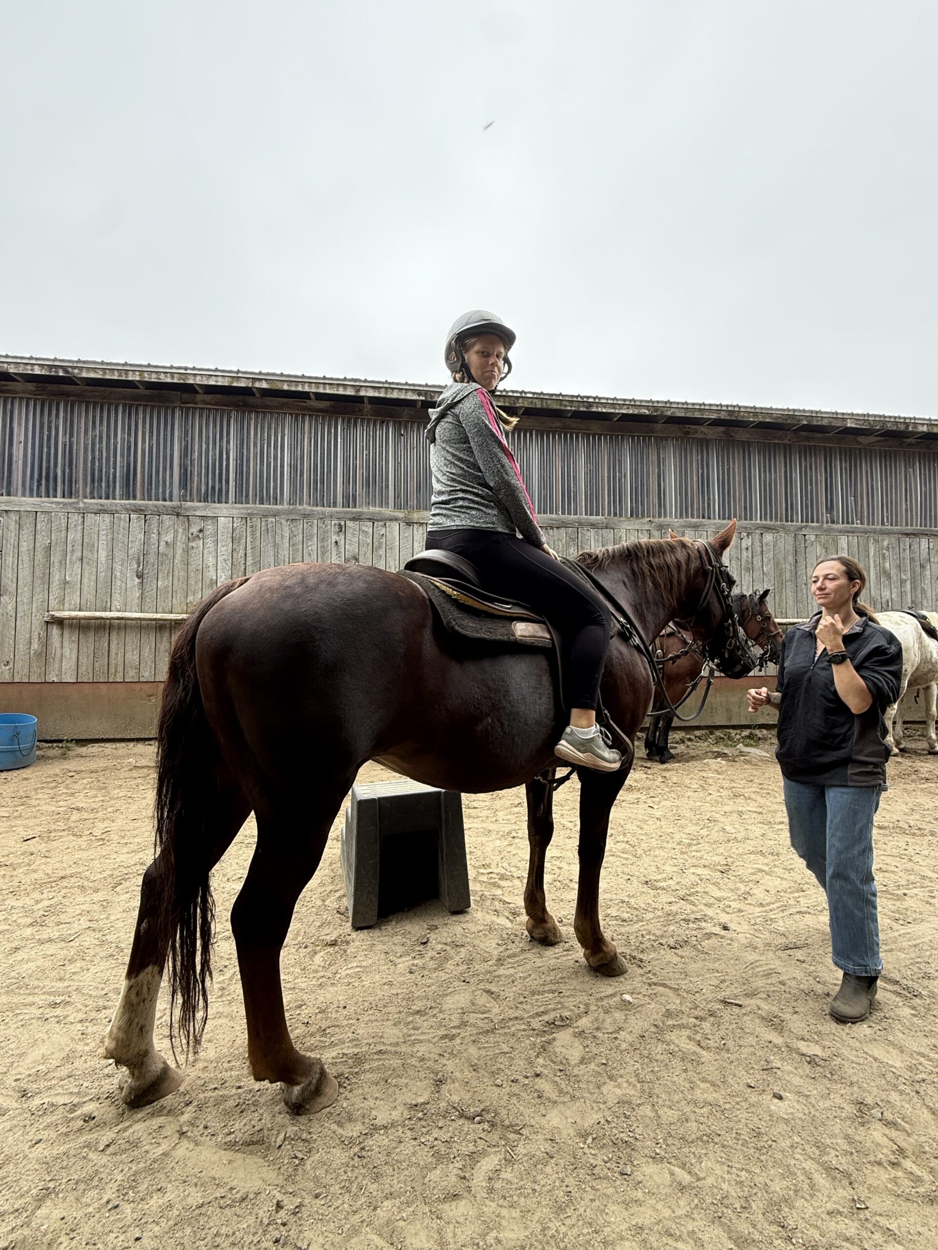 a woman is sitting on a horse, Val-des-Lacs, Québec, Canada