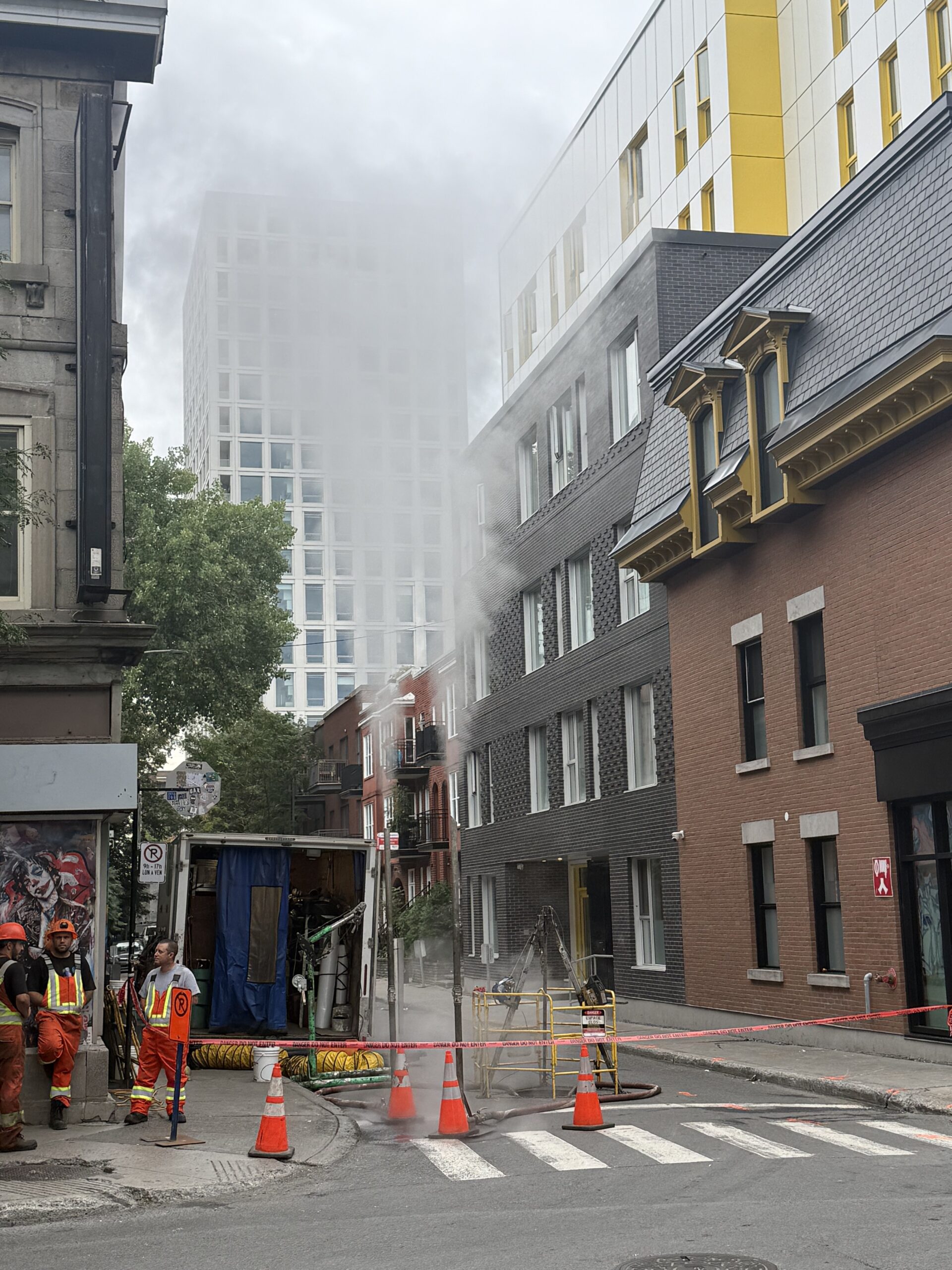 a fire is coming out of a building, Montréal, Québec, Canada