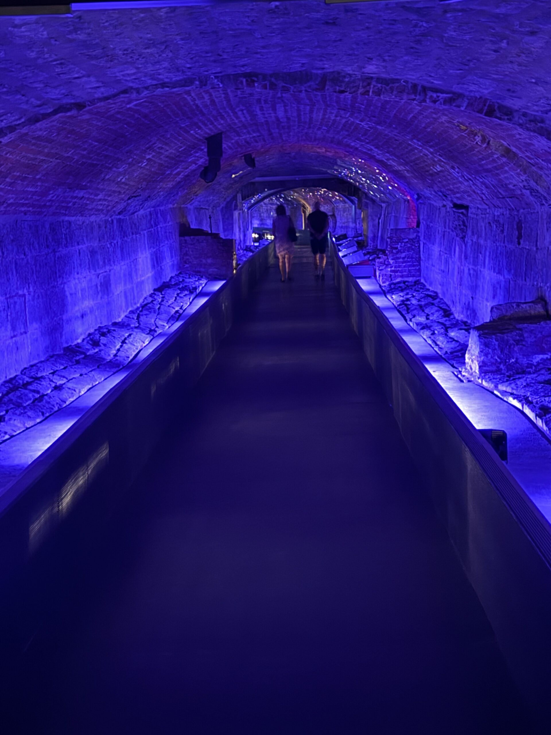 a tunnel with a long walkway between it, Montréal, Québec, Canada