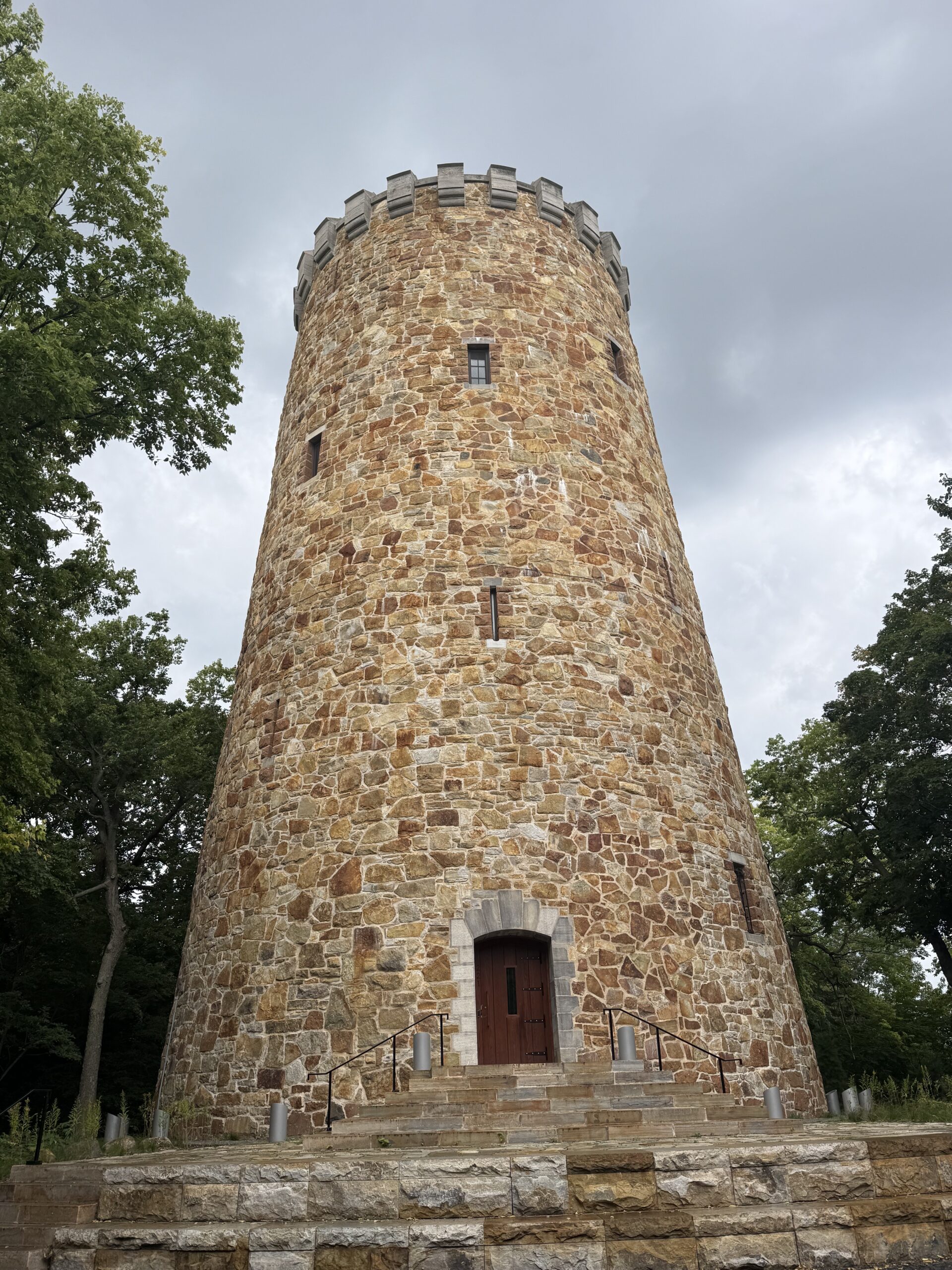 a stone tower with a clock on top, Montréal, Québec, Canada
