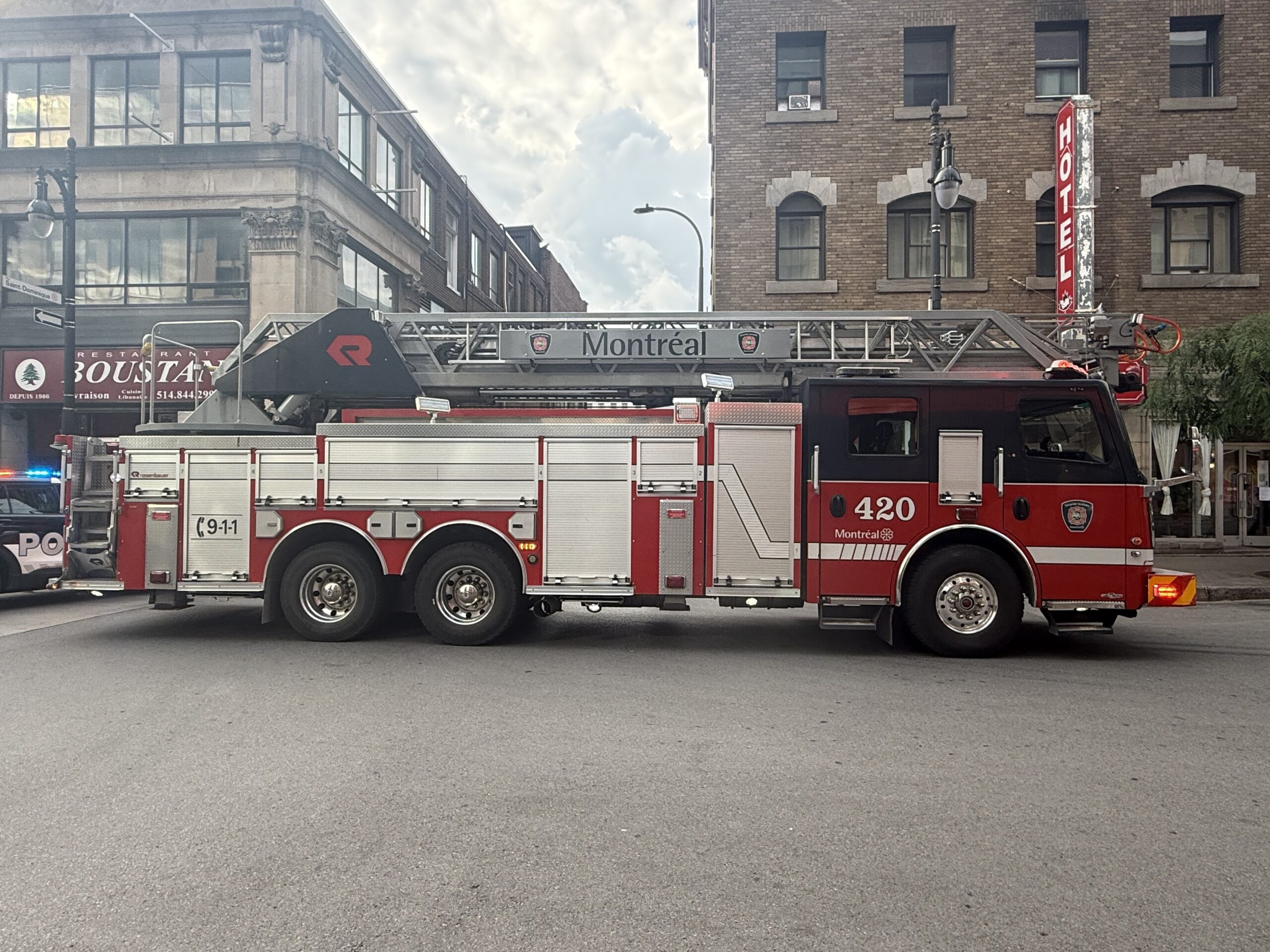 a fire truck parked in a parking, Montréal, Québec, Canada